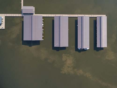 clarksville aerial photography of gray roof buildings on body of water building